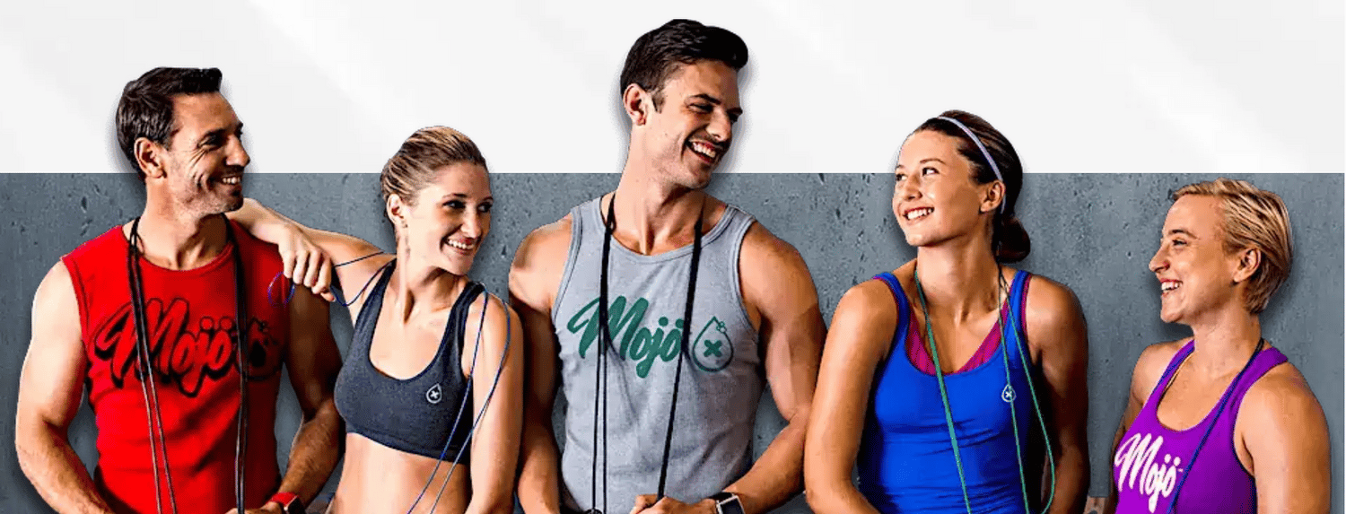 The Mojo crew โ five friends in Mojo tank tops laughing together